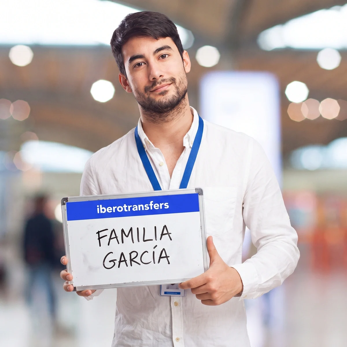 Driver holding a name sign at the airport